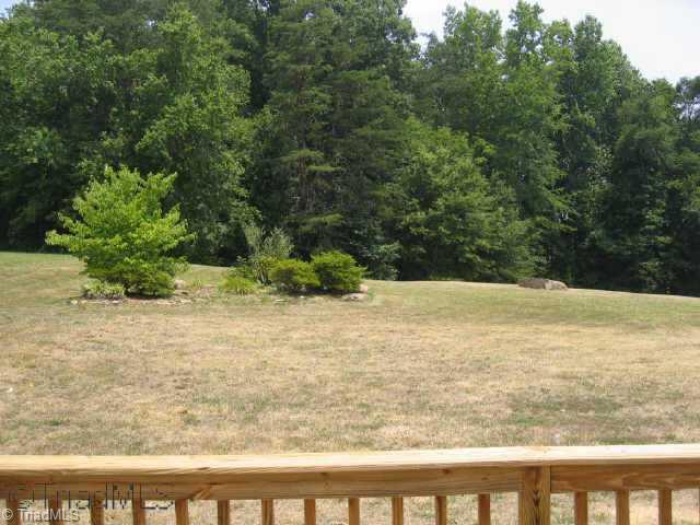 7506 Keating Drive Oak Ridge, NC 27310 - Photo 8 of 8 Other. Backyard