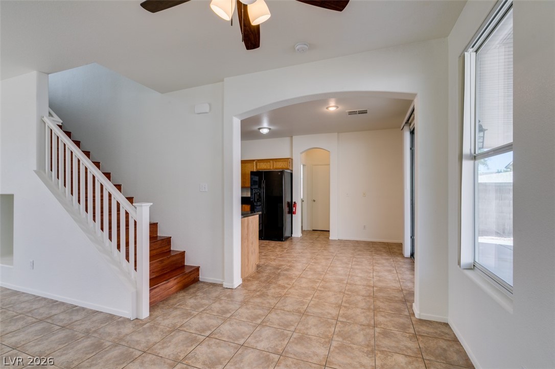 4957 Miners Ridge Drive Las Vegas, NV 89122 - Photo 19 of 39 This inviting space features a seamless flow, connecting distinct areas with thoughtful design and natural light.