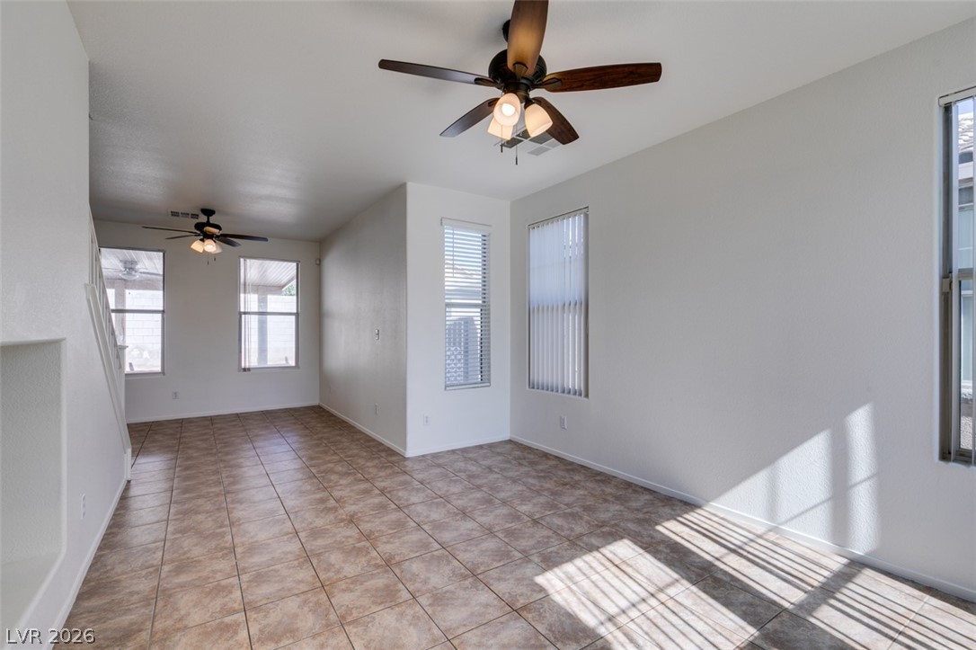 4957 Miners Ridge Drive Las Vegas, NV 89122 - Photo 5 of 39 This bright, open space features clean lines and a functional layout, perfect for modern living.