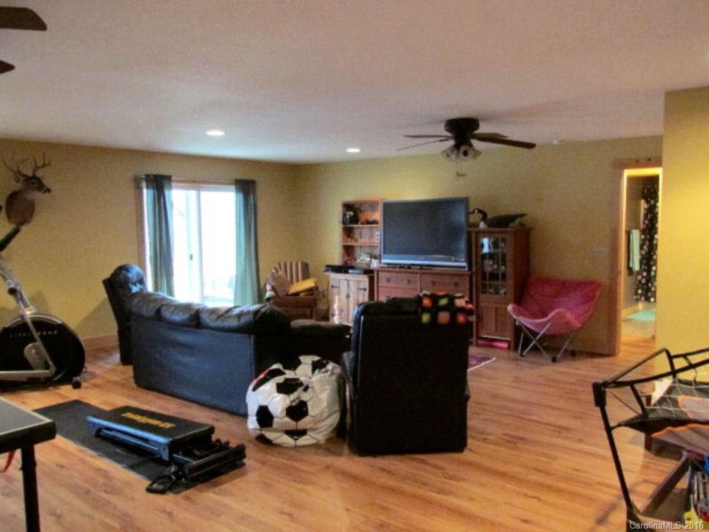 2574 Cabin Flats Road Sylva, NC 28779 - Photo 17 of 22 a living room with furniture and a window