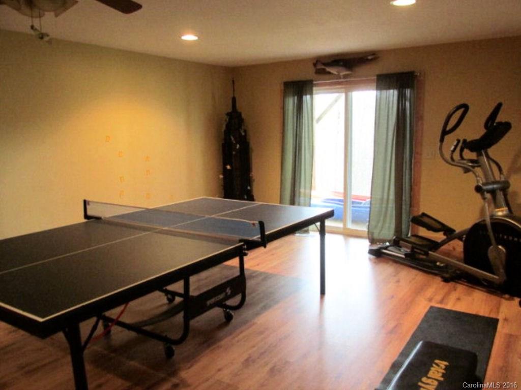 2574 Cabin Flats Road Sylva, NC 28779 - Photo 18 of 22 a view of a room with gym equipment