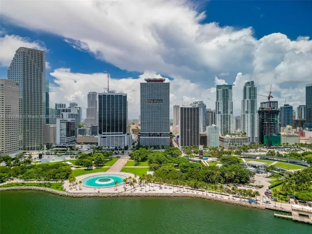 a view of a city with tall buildings