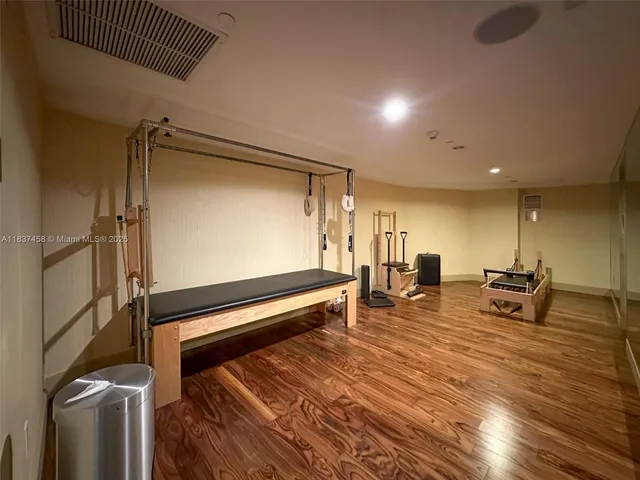 a lobby with furniture and a table