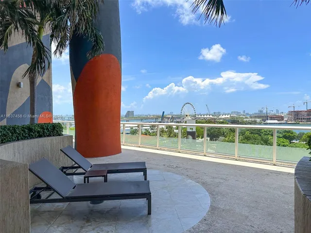 a view of a garden with a bench