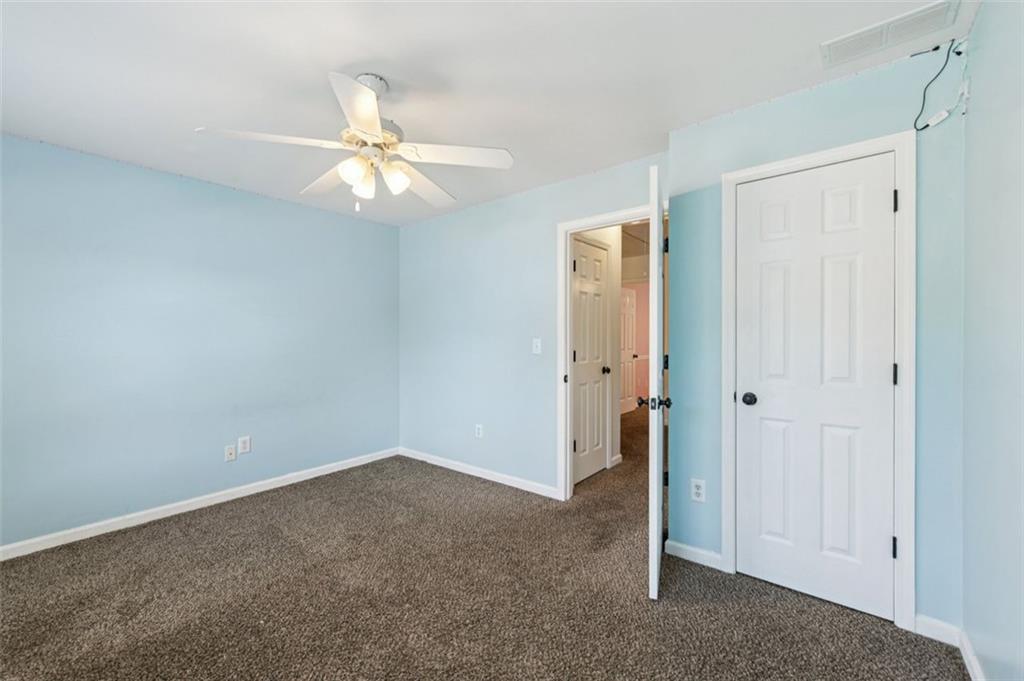 2435 Cobble Creek Lane Grayson, GA 30017 - Photo 32 of 39 wooden floor in an empty room
