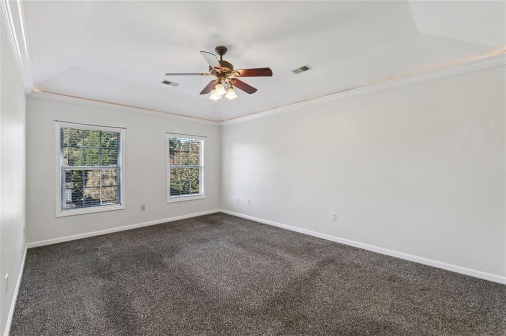 2435 Cobble Creek Lane Grayson, GA 30017 - Photo 38 of 39 a view of an empty room with a window