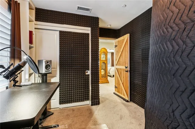 a view of gym equipment and windows