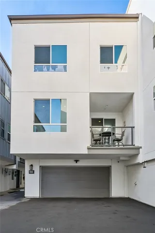 a view of a balcony with furniture