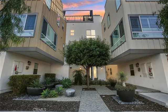 a living room with furniture a rug and a window
