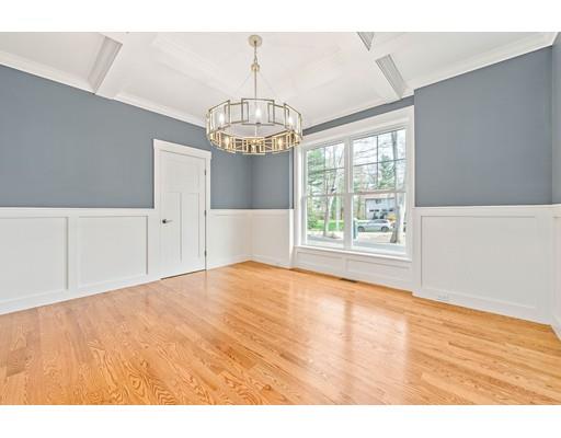 84 Forest Avenue Cohasset, MA 02025 - Photo 12 of 30 a view of empty room with wooden floor and chandelier