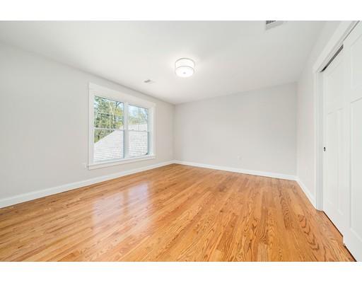 84 Forest Avenue Cohasset, MA 02025 - Photo 22 of 30 a view of an empty room with wooden floor and a window