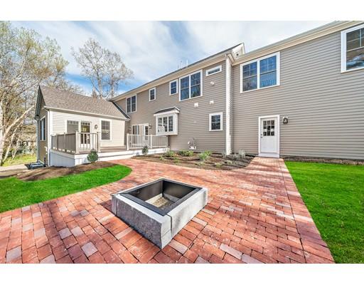 84 Forest Avenue Cohasset, MA 02025 - Photo 29 of 30 a front view of house with yard and green space
