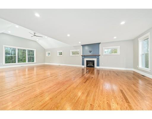 84 Forest Avenue Cohasset, MA 02025 - Photo 8 of 30 a view of empty room with wooden floor and fan