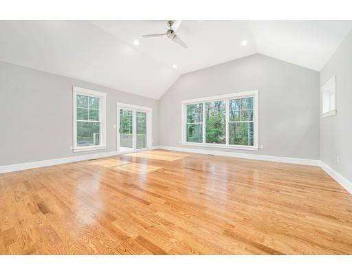84 Forest Avenue Cohasset, MA 02025 - Photo 9 of 30 an empty room with wooden floor and windows