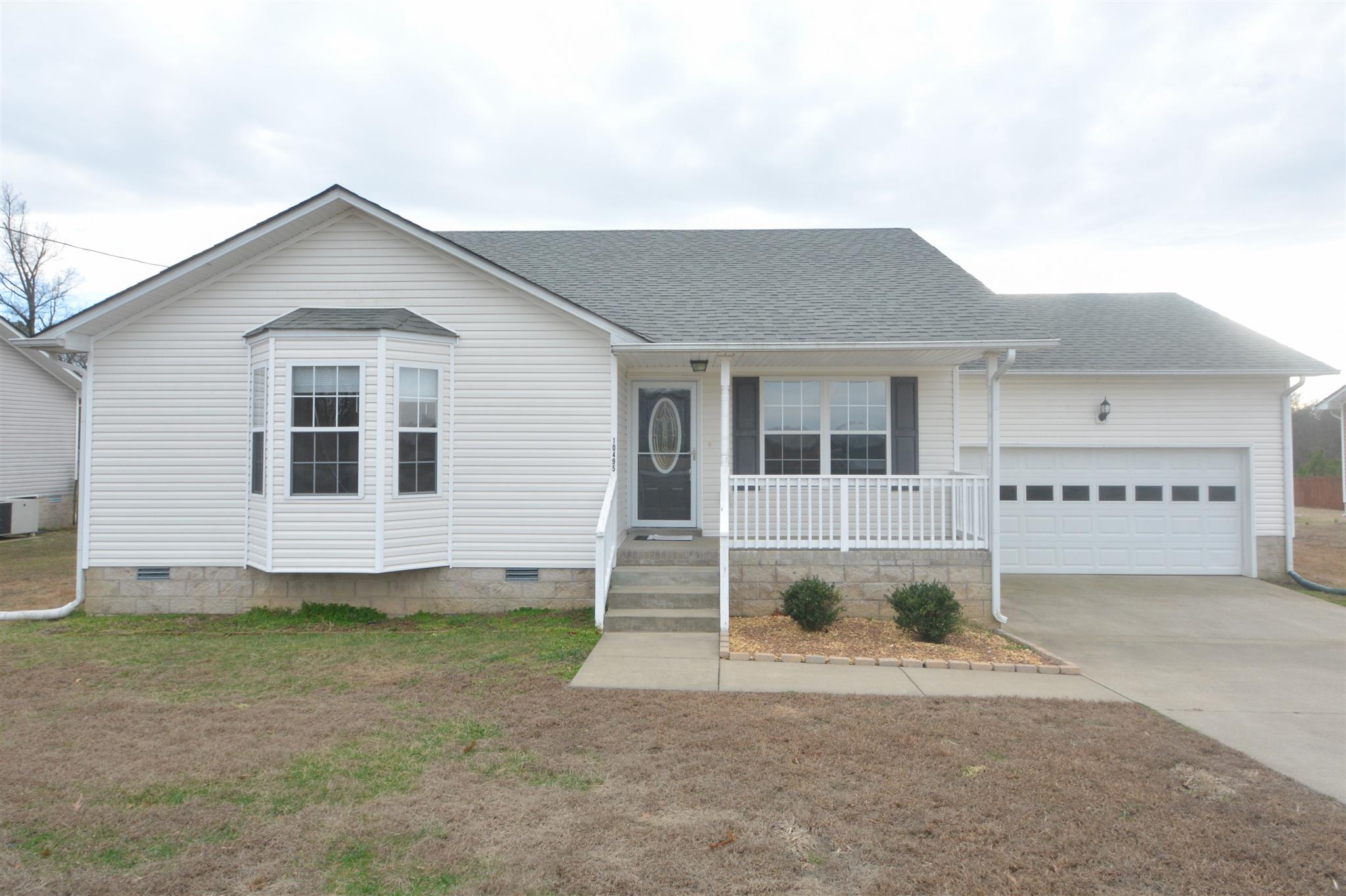 10495 Bell Station Road Oak Grove, KY 42262 - Photo 1 of 18 a view of a house with a yard and wooden fence