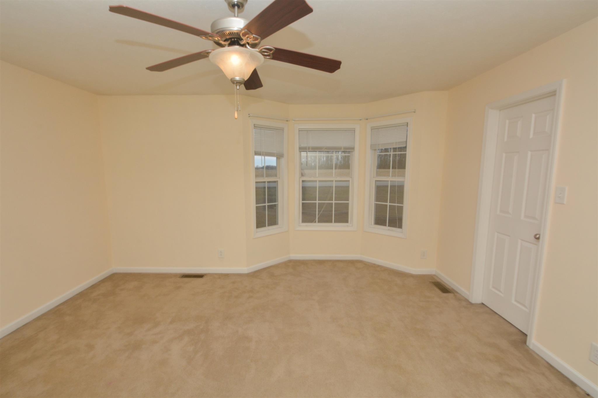 10495 Bell Station Road Oak Grove, KY 42262 - Photo 11 of 18 a view of an empty room with a window