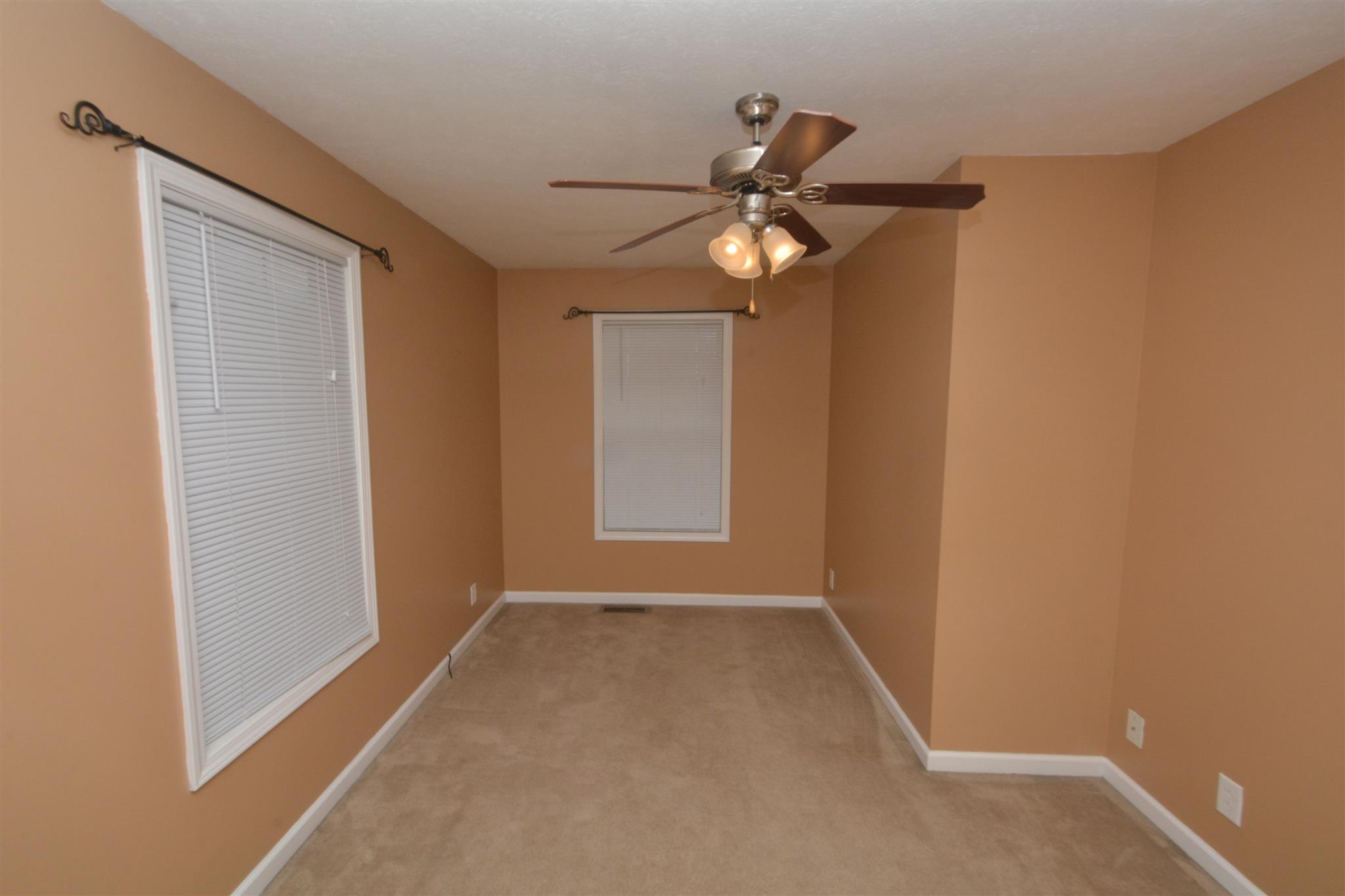10495 Bell Station Road Oak Grove, KY 42262 - Photo 15 of 18 a view of a livingroom with a ceiling fan and window