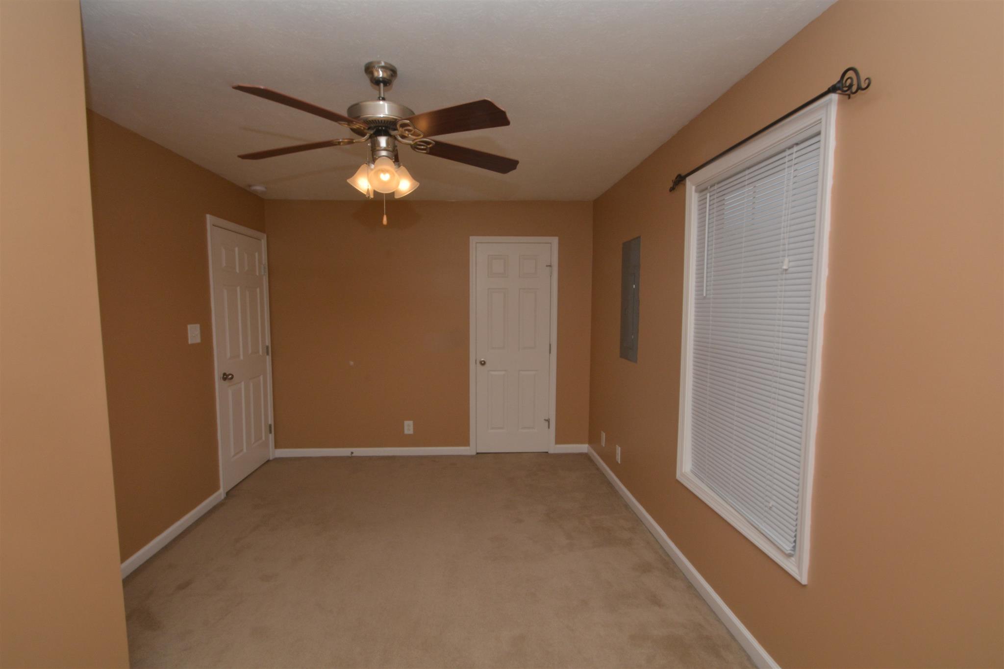 10495 Bell Station Road Oak Grove, KY 42262 - Photo 16 of 18 a view of an empty room and chandelier fan