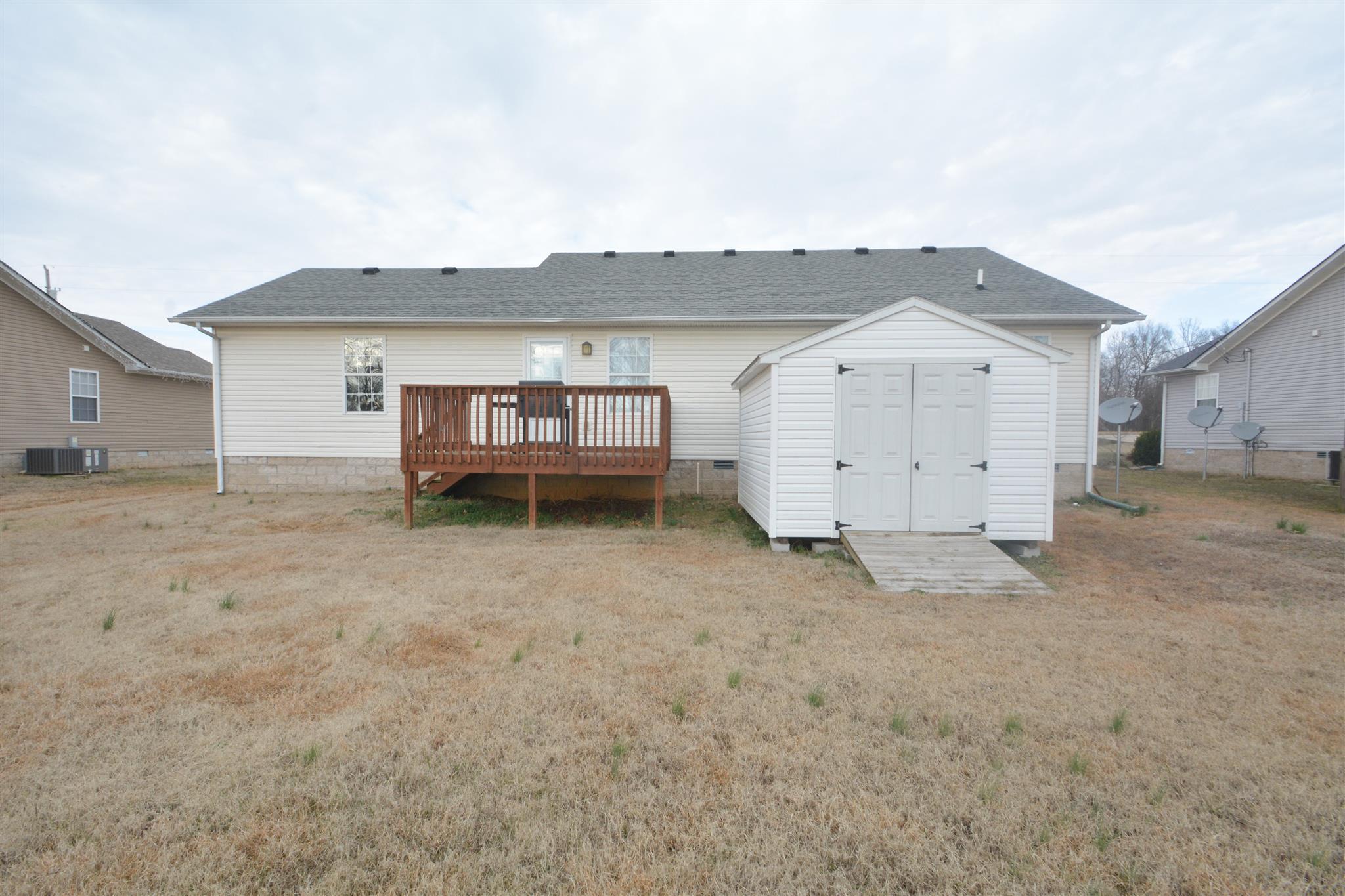 10495 Bell Station Road Oak Grove, KY 42262 - Photo 18 of 18 a view of a house with a backyard
