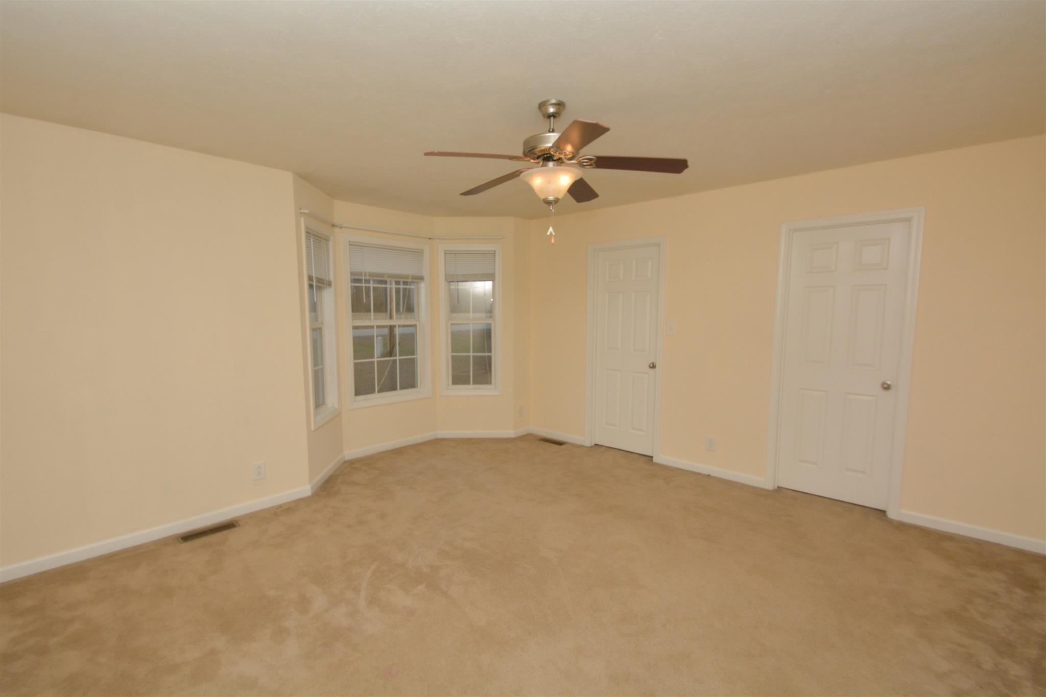 10495 Bell Station Road Oak Grove, KY 42262 - Photo 10 of 18 a view of an empty room with a window