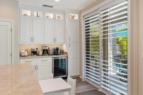 a living room with furniture fireplace and flat screen tv