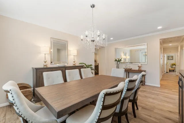 a bedroom with bed room and flat screen tv