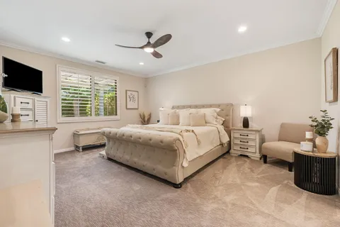 a bathroom with a shower and a sink