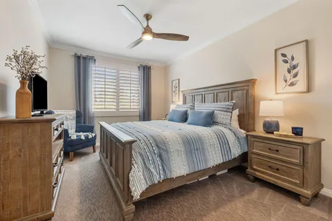 a view of a backyard with sitting area