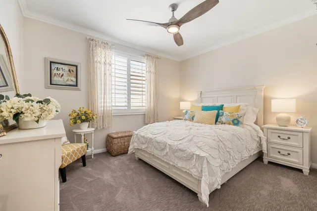 a view of a swimming pool with a table and chairs