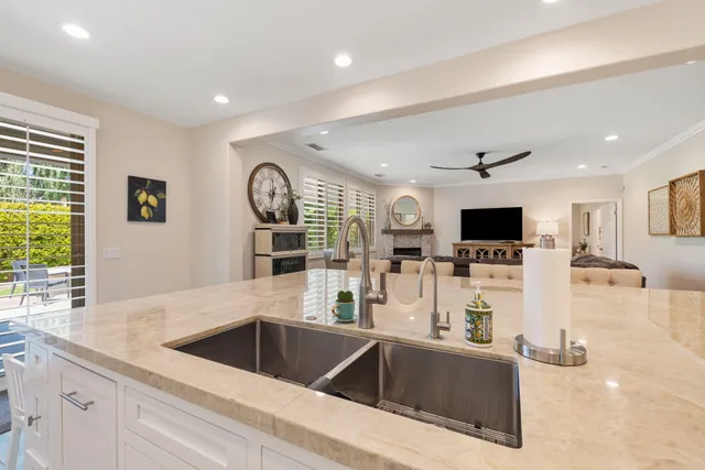a kitchen with a stove and cabinets