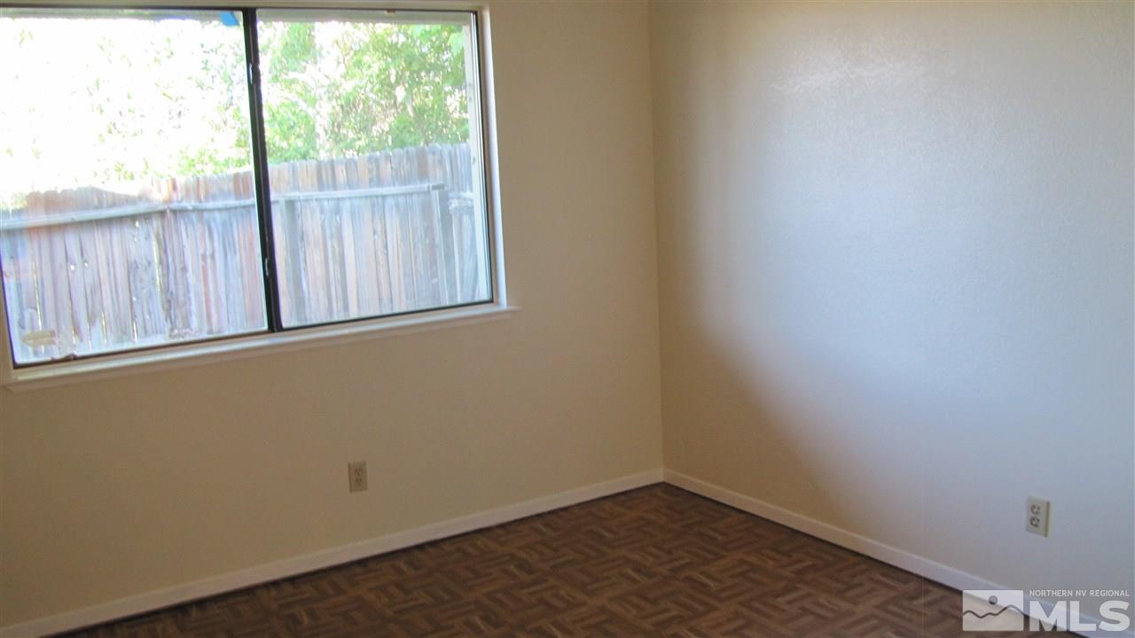 3470 Bowie Road Reno, NV 89503 - Photo 13 of 25 a view of a small space with wooden floor and a window