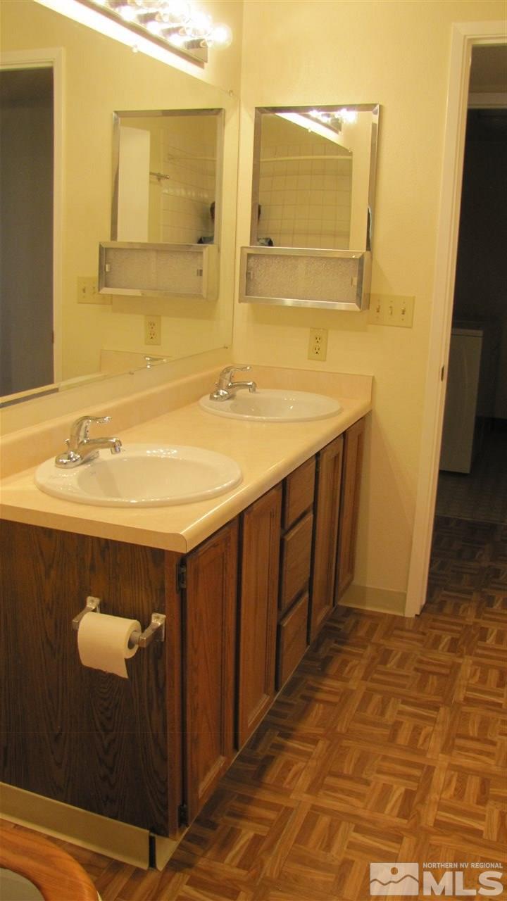 3470 Bowie Road Reno, NV 89503 - Photo 15 of 25 a bathroom with a sink and a mirror