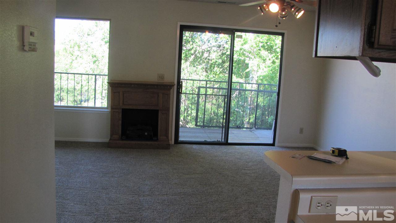 3470 Bowie Road Reno, NV 89503 - Photo 5 of 25 a room with a window and a fireplace