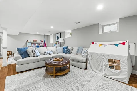 a living room with furniture and a couch