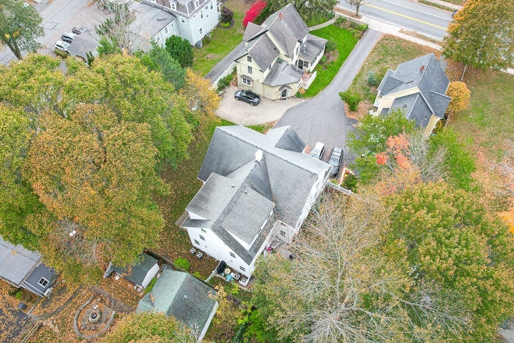 209 Washington Street, Unit 209 Winchester, MA 01890 - Photo 33 of 35 an aerial view of a house with outdoor space