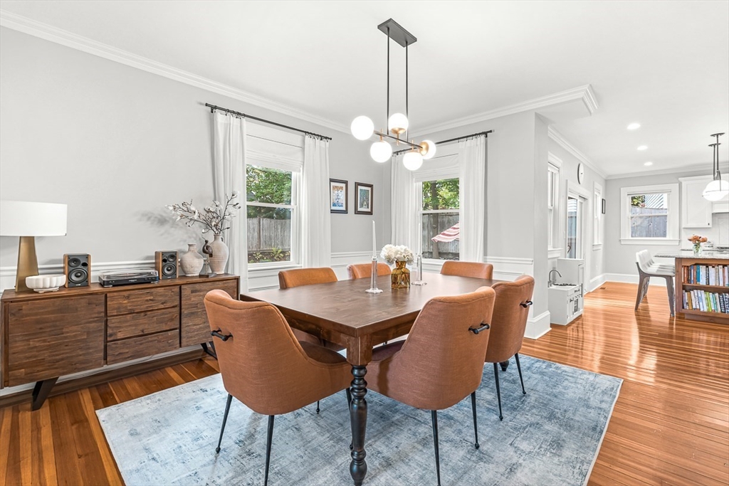 209 Washington Street, Unit 209 Winchester, MA 01890 - Photo 6 of 35 a view of a dining room with furniture window and wooden floor