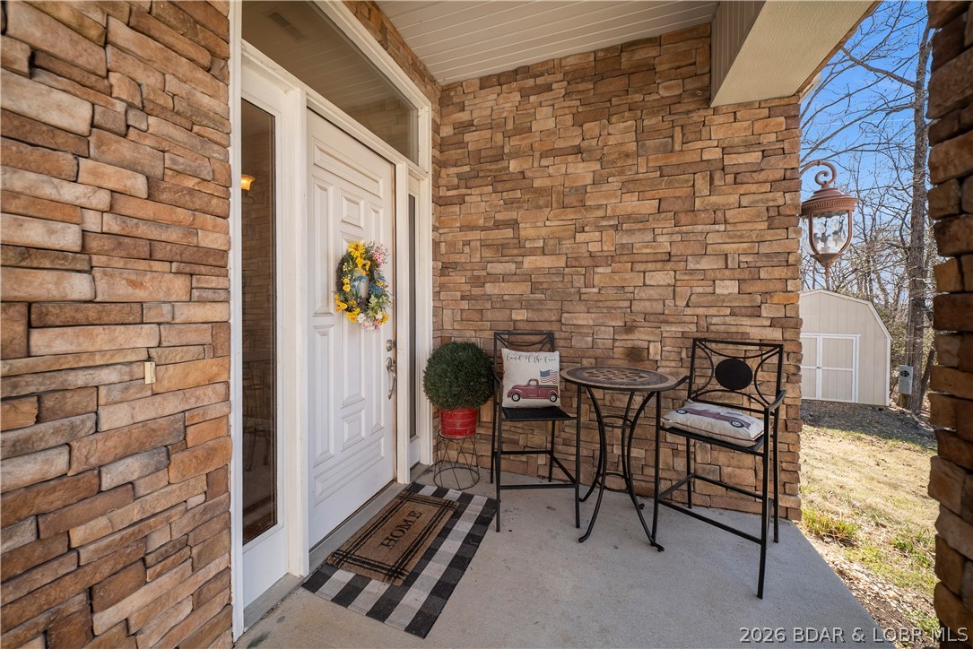 47 Mockingbird Road Lake Ozark, MO 65049 - Photo 6 of 65 Front door entrance of 47 mockingbird rd
