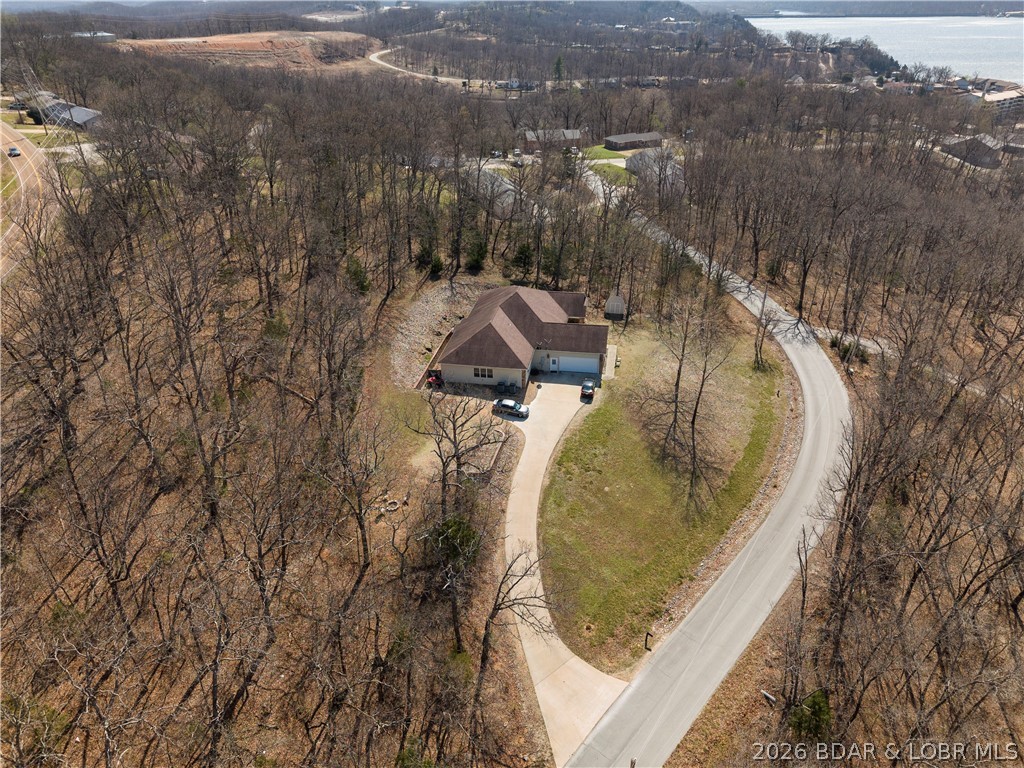 47 Mockingbird Road Lake Ozark, MO 65049 - Photo 64 of 65 overview with the road access
