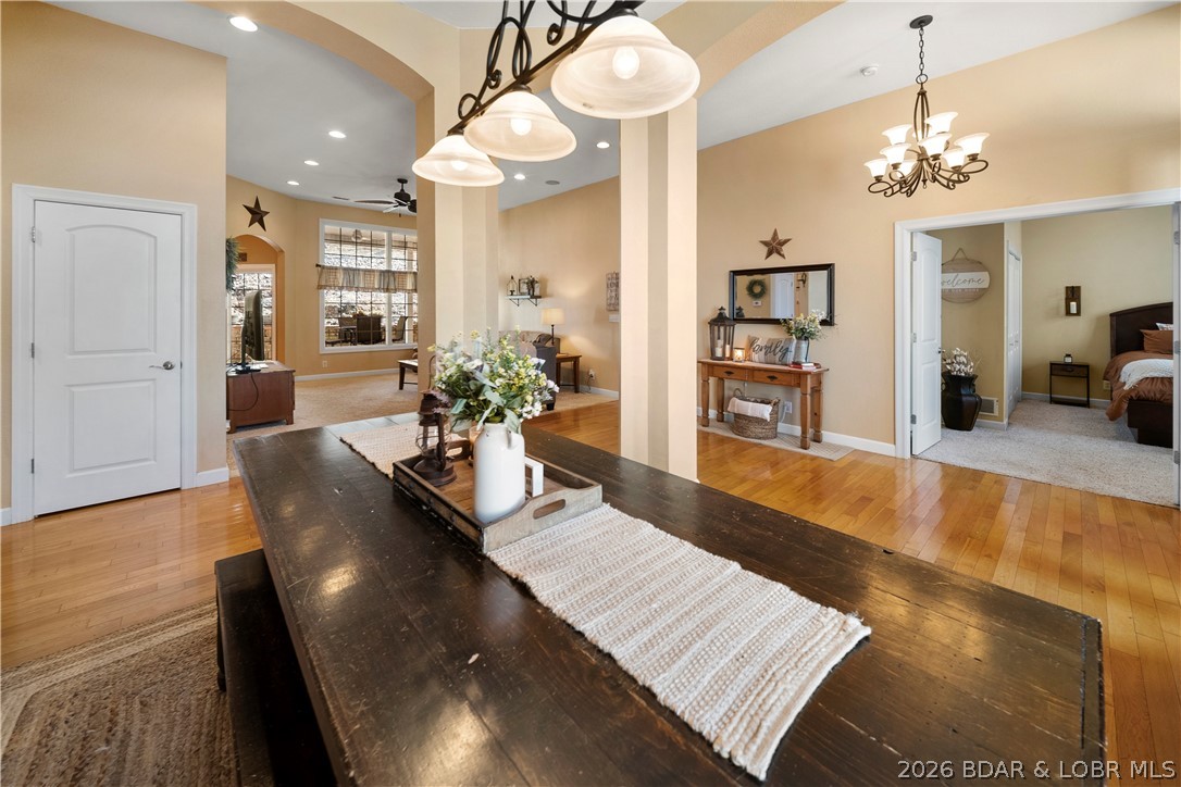 47 Mockingbird Road Lake Ozark, MO 65049 - Photo 10 of 65 wooden table looking into living room