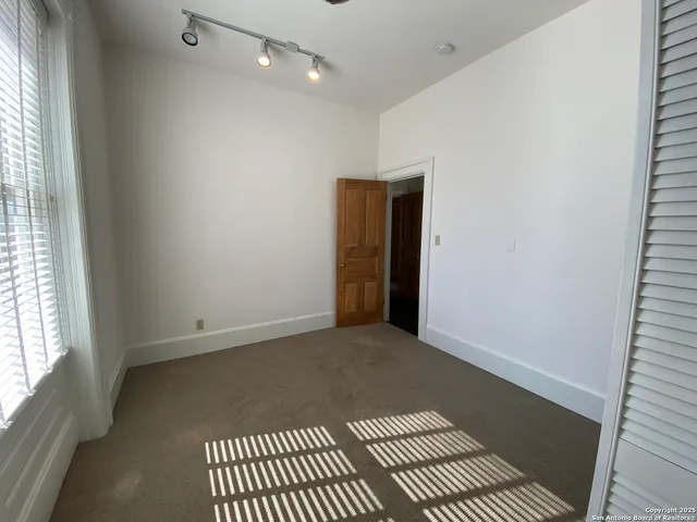 a bathroom with a sink and shower