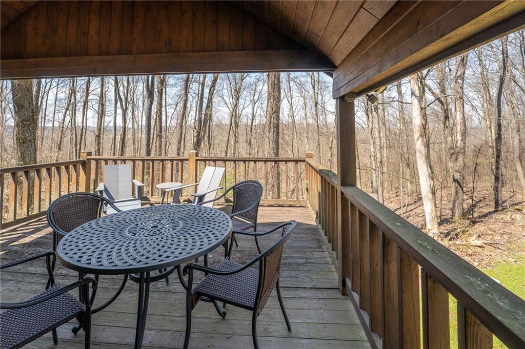 620 The Maples Farmington, PA 15437 - Photo 23 of 38 a view of a chair and table in the balcony