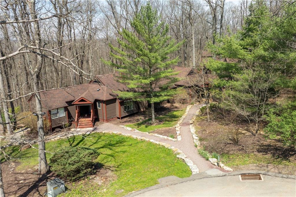 620 The Maples Farmington, PA 15437 - Photo 28 of 38 a view of a backyard with plants and a patio