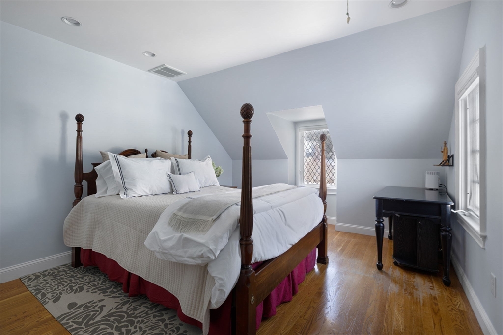 20 Risley Road Newton, MA 02465 - Photo 18 of 41 a bedroom with a bed and a dresser