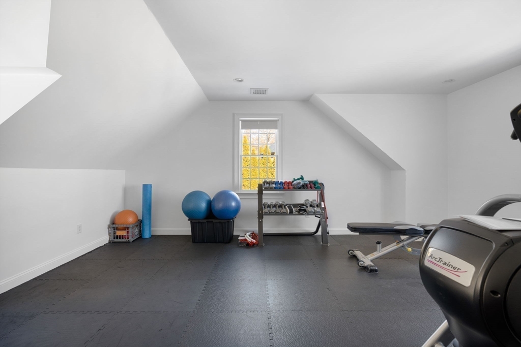 20 Risley Road Newton, MA 02465 - Photo 22 of 41 a room with a couch and a window