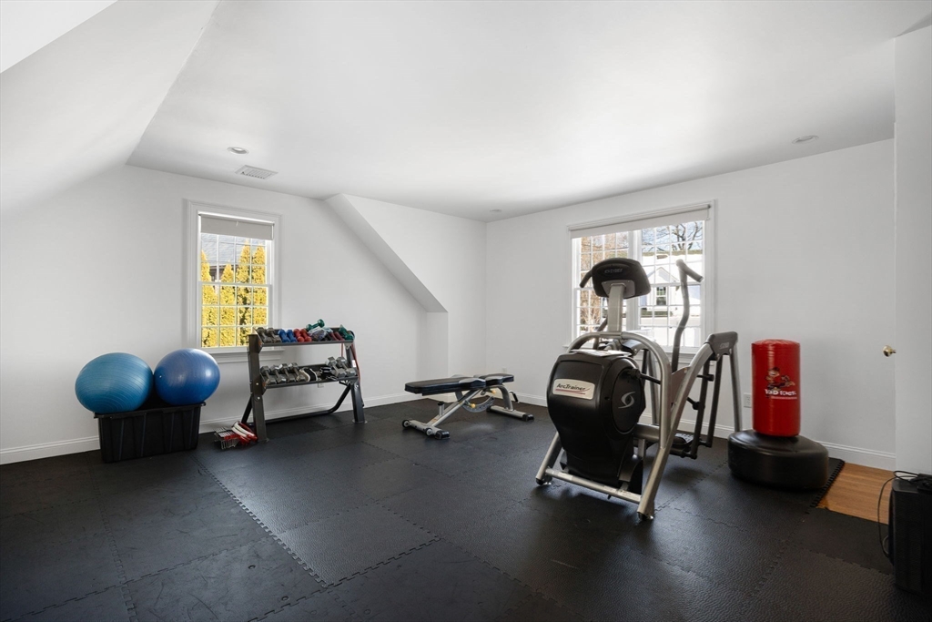 20 Risley Road Newton, MA 02465 - Photo 23 of 41 a room with gym equipment and windows