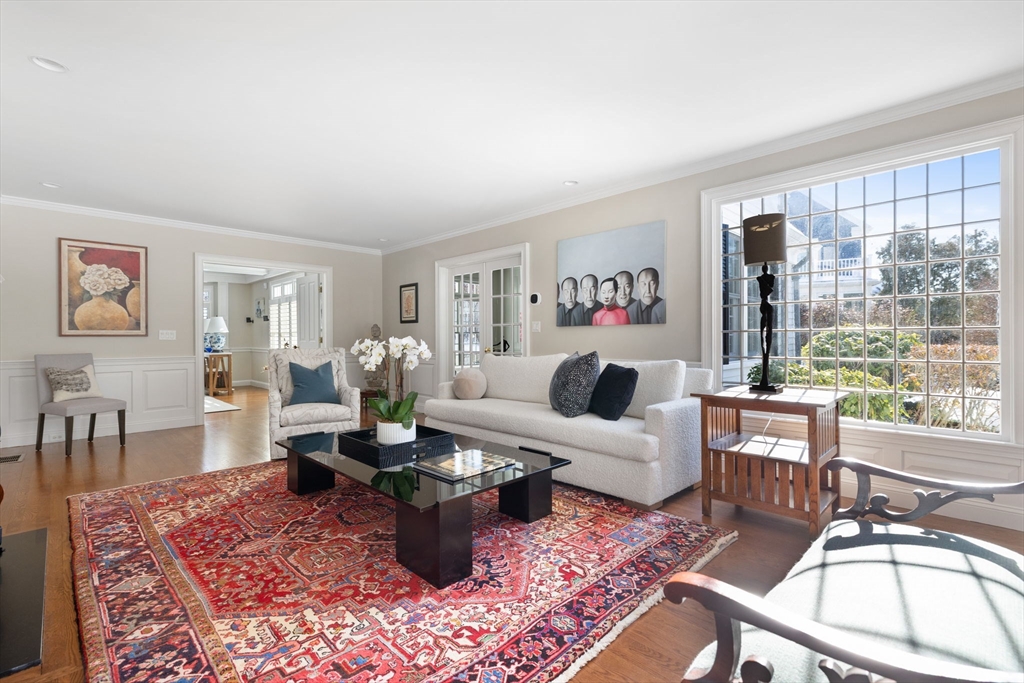 20 Risley Road Newton, MA 02465 - Photo 3 of 41 a living room with furniture large window and wooden floor