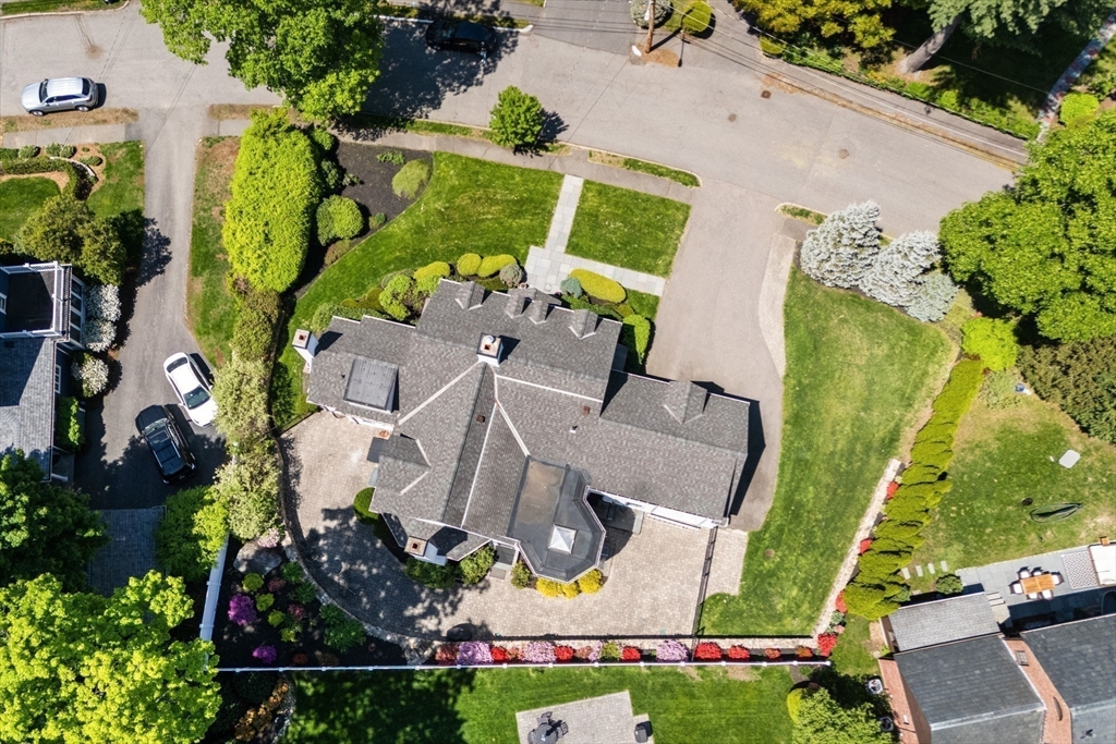 20 Risley Road Newton, MA 02465 - Photo 40 of 41 an aerial view of a house with a yard and garden