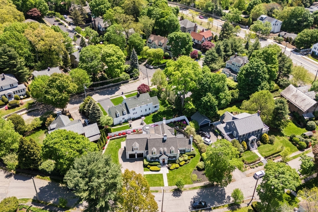20 Risley Road Newton, MA 02465 - Photo 41 of 41 an aerial view of multiple houses with yard