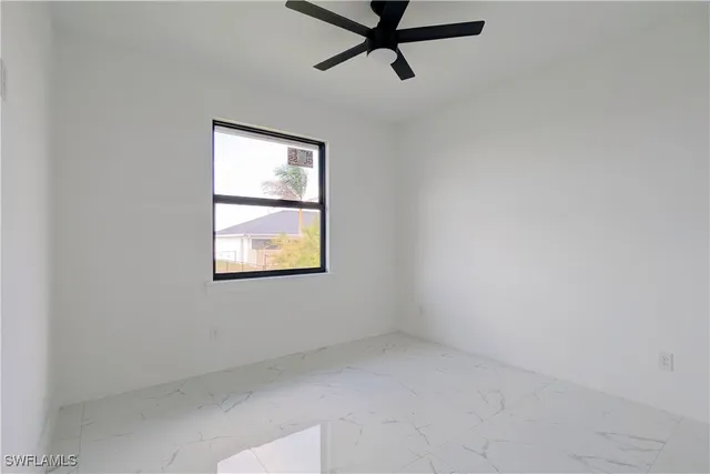 a view of a window in an empty room