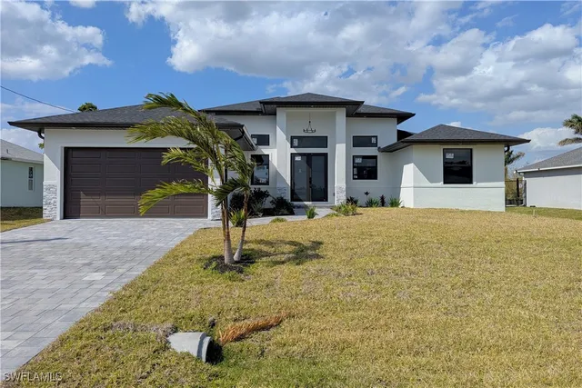 a house view with a garden space